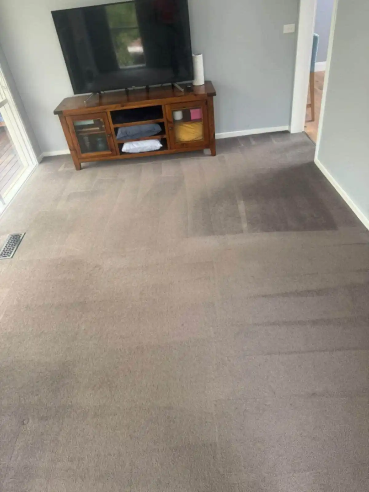 Freshly steam cleaned lounge room carpet in a Melbourne home