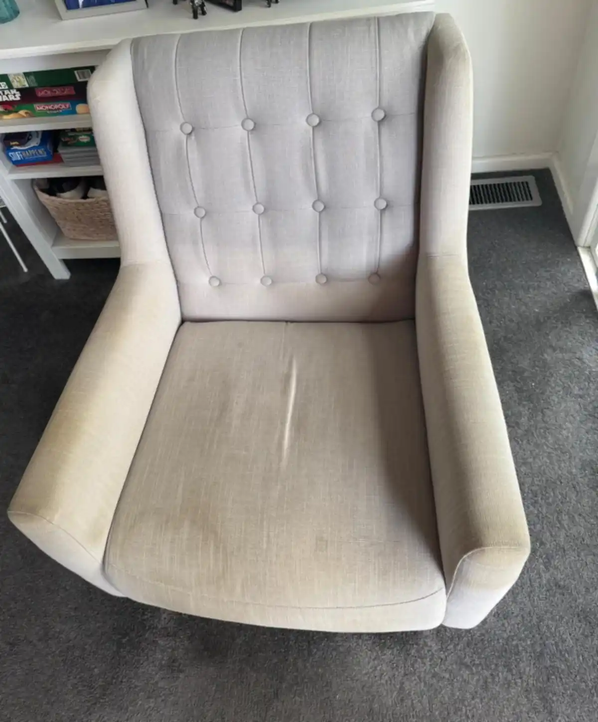 Cream buttoned wingback armchair cleaned by Aussie Shine Services